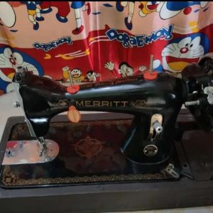 Singer sewing machine with box